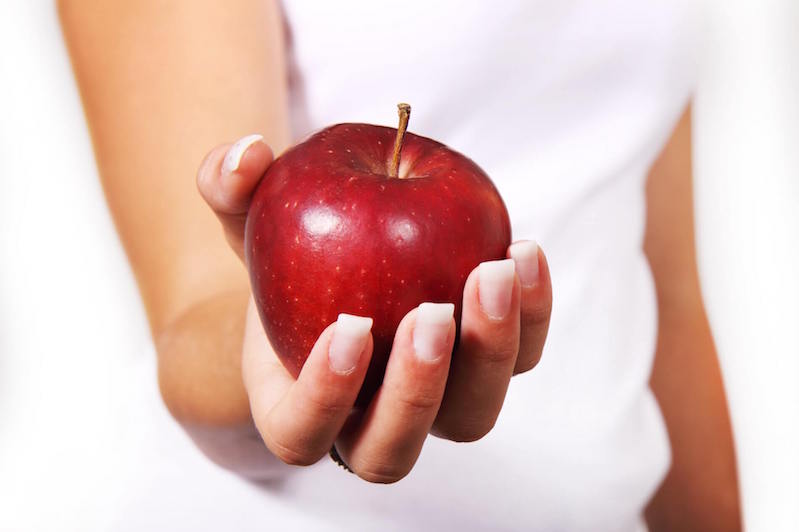 Shakeology benefit - Hand holding apple